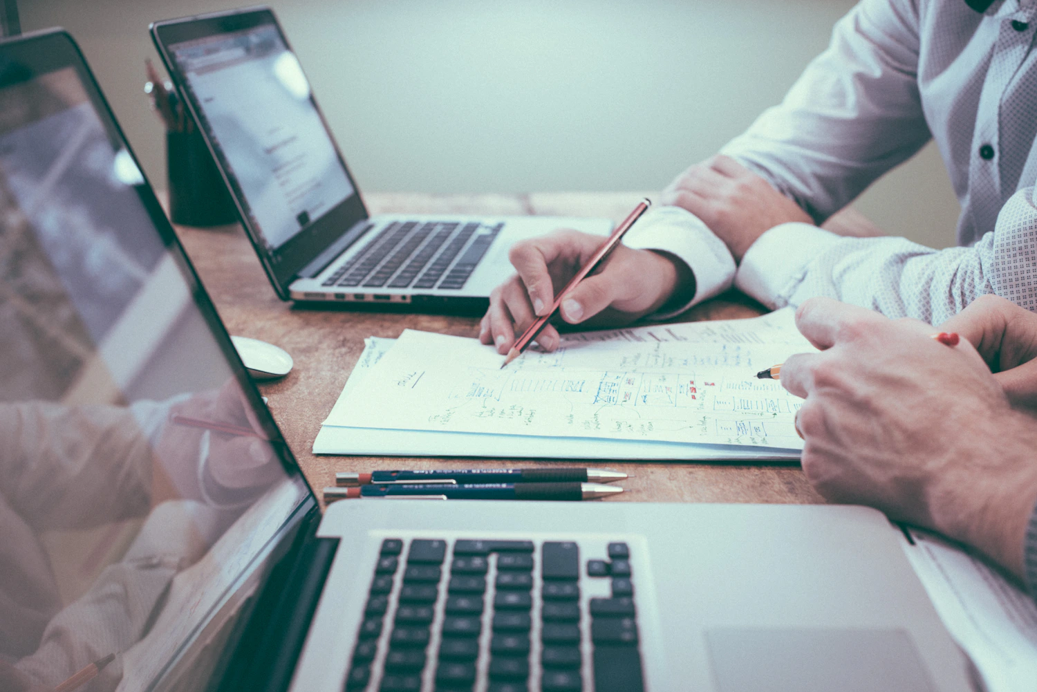 Business documents being reviewed at a desk